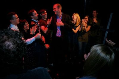 The cast welcomes director D.H. Johnson onstage Photo