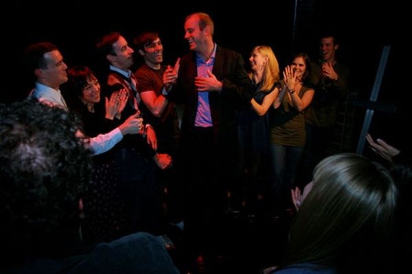 The cast welcomes director D.H. Johnson onstage Photo