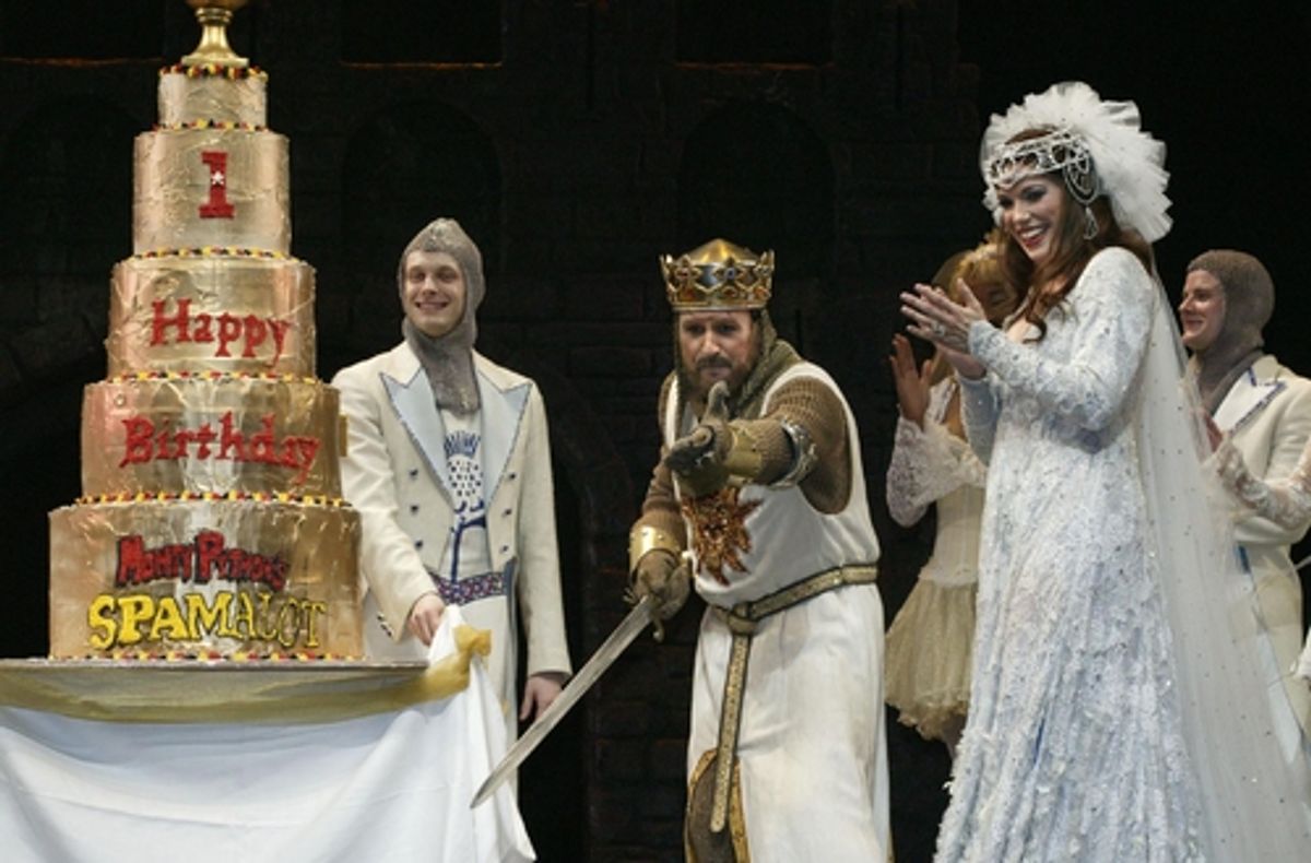 Peter Davison and Hannah Waddingham present the birthday cake at the curtain call at 