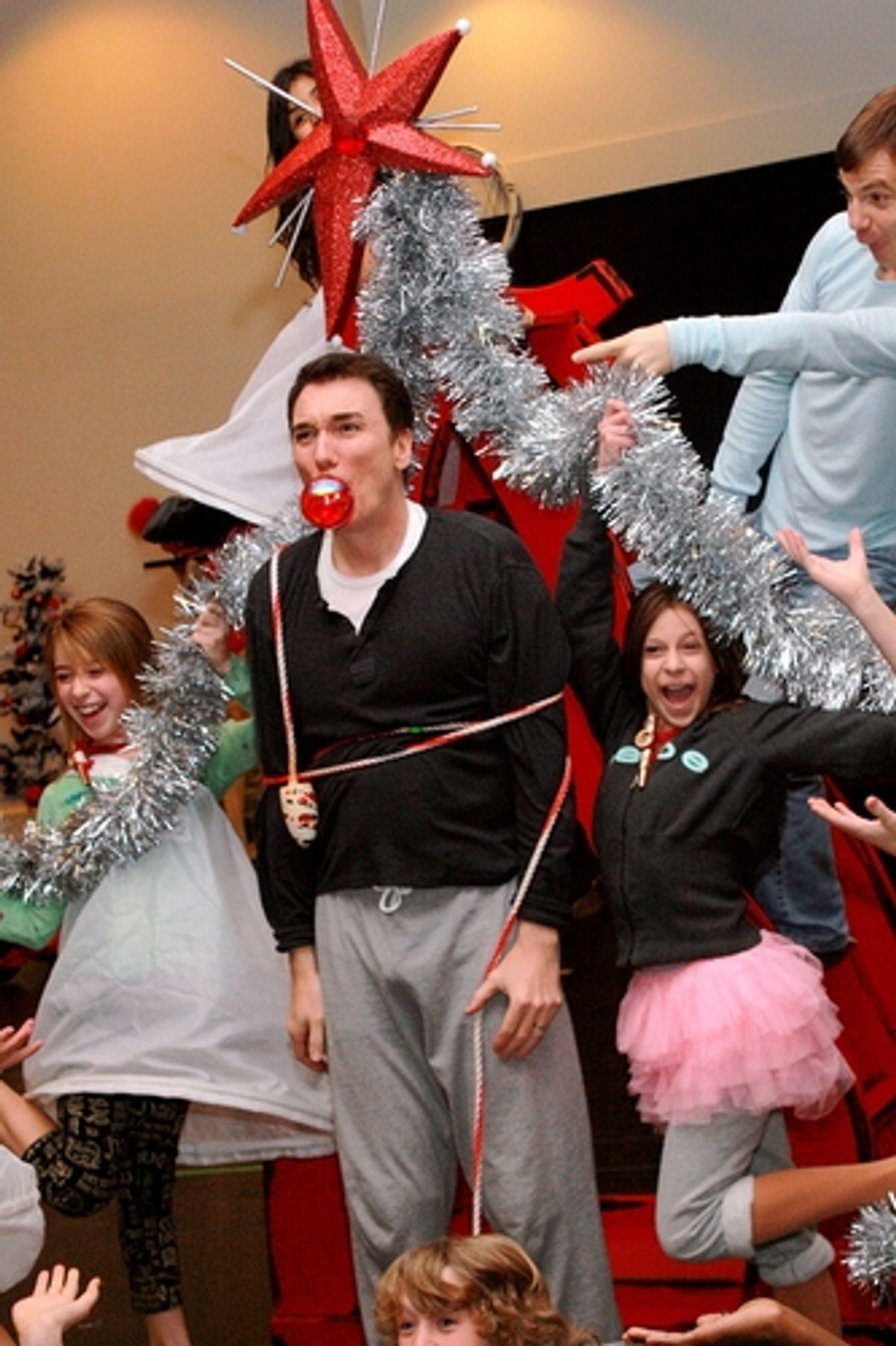 Patrick Page (center), Rusty Ross (top right) and The Who Children at 