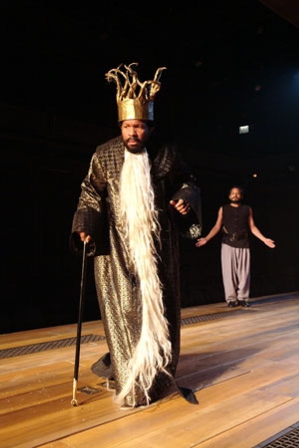 (l-r) King Pelias (Allen Gilmore) tells his servant (Jesse J. Perez) about a dark pro Photo