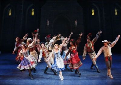 Sutton Foster (center) with the company Photo