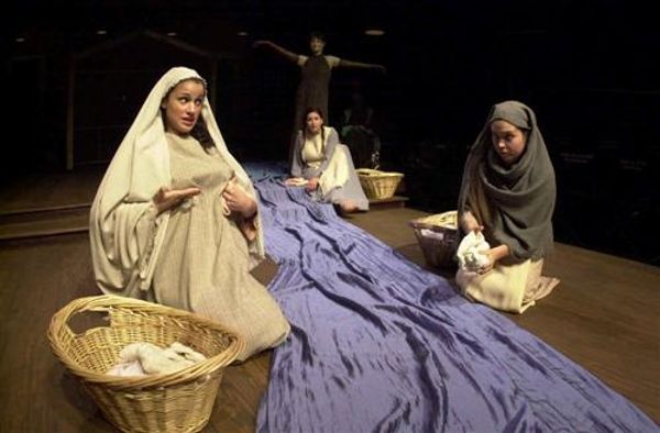 Local village women (far left, Ashley Kenner & far right, Erin Olson) discuss the vir Photo