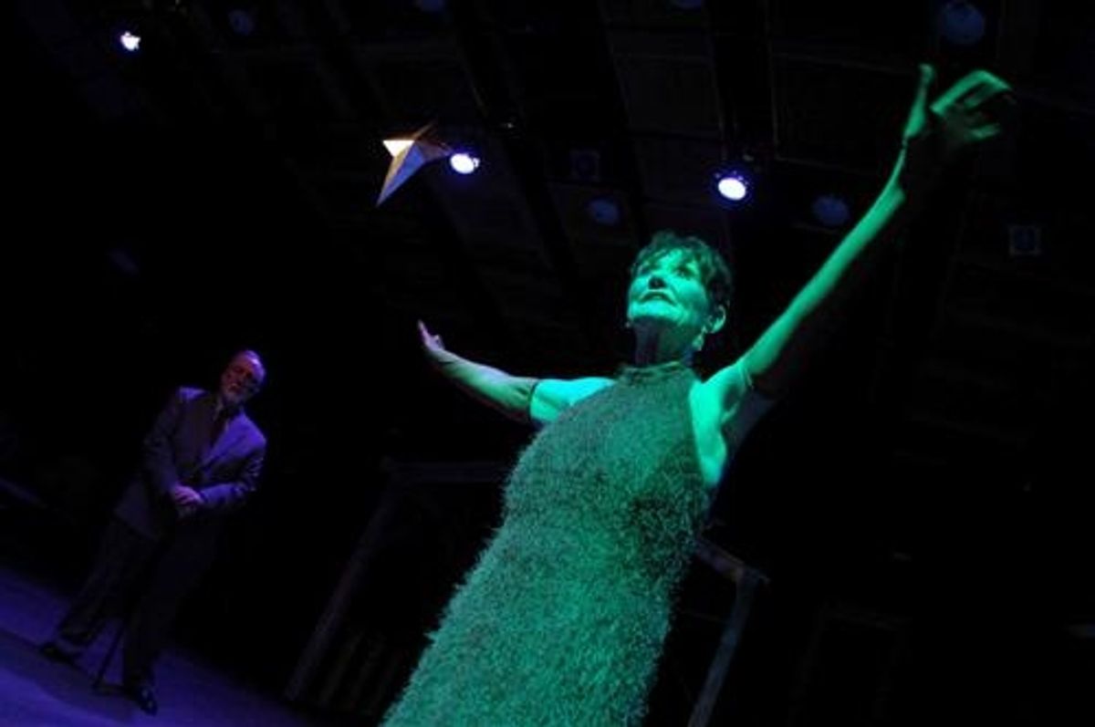 The Man in Gray (left, Bob Colonna) cuts a deal with the Tree (right, Isabel O'Donnell). at 