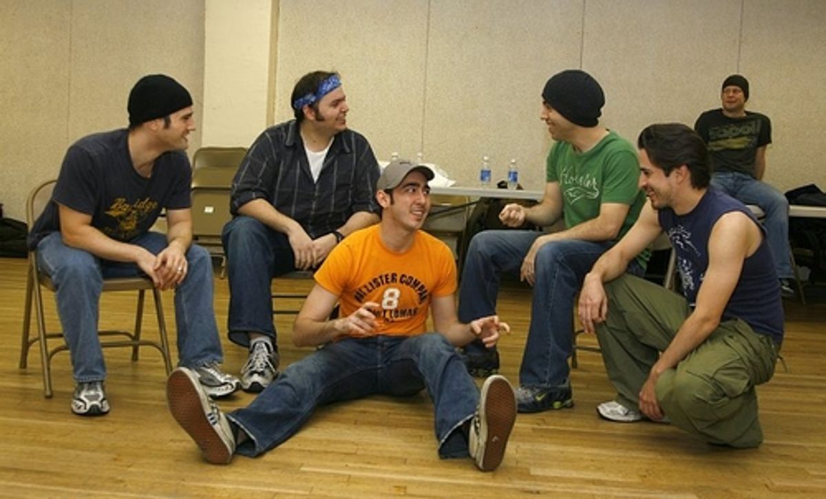 Max Crumm rehearses with the cast of Grease at 