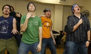 Max Crumm with the cast of Grease Photo