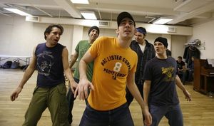 Max Crumm with the boys of Grease Photo