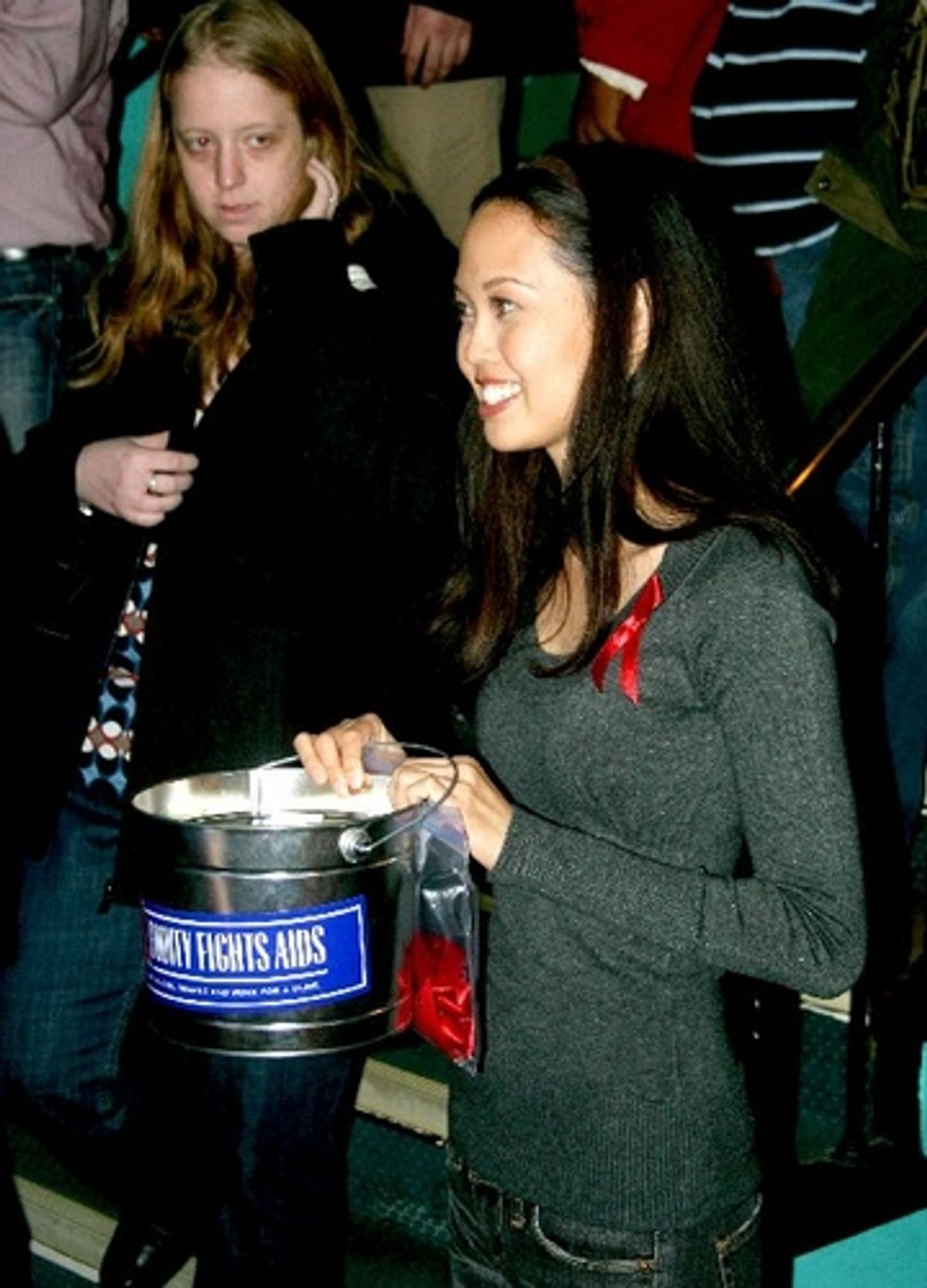 Jennie Kwan collects money for BC/EFA after the show at 
