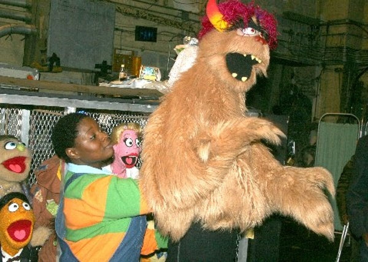 Danielle K Thomas assists in the demonstration at 