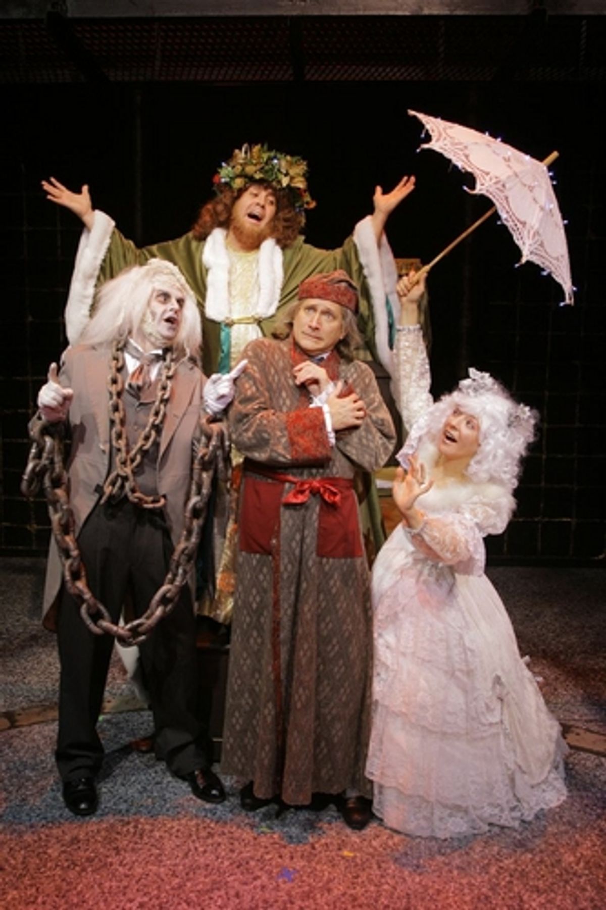 David Edwards as Scrooge (center) and ghostly visitors (clockwise from left), Gary Troy, Michael J. Farina, Christine Ditota at 'A Christmas Carol' Musical at WBT