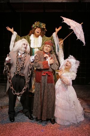 David Edwards as Scrooge (center) and ghostly visitors (clockwise from left), Gary Tr Photo