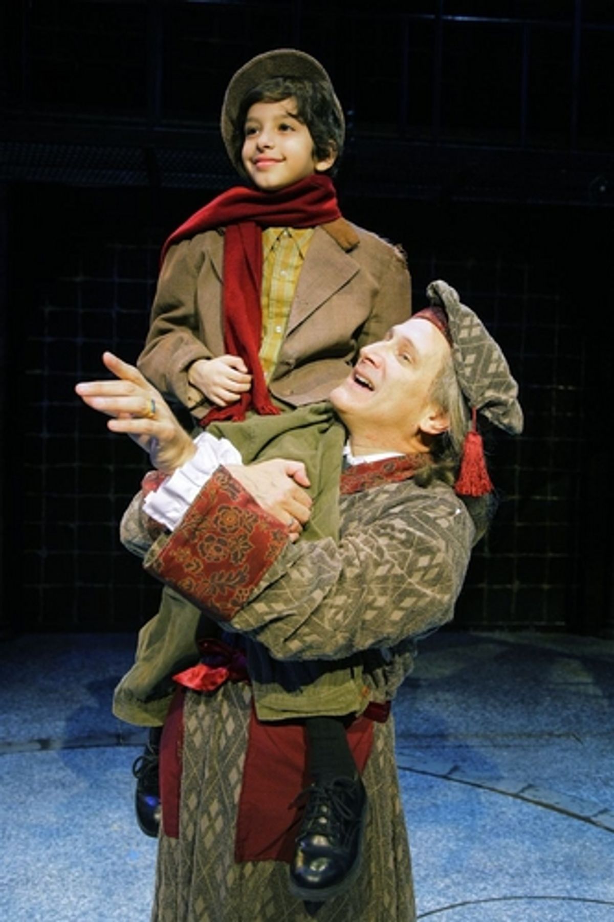 David Edwards (Scrooge) and Troy Tropicchio (Tiny Tim) at 