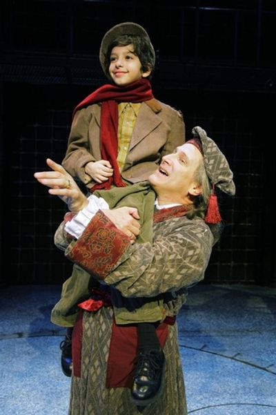 David Edwards (Scrooge) and Troy Tropicchio (Tiny Tim) Photo