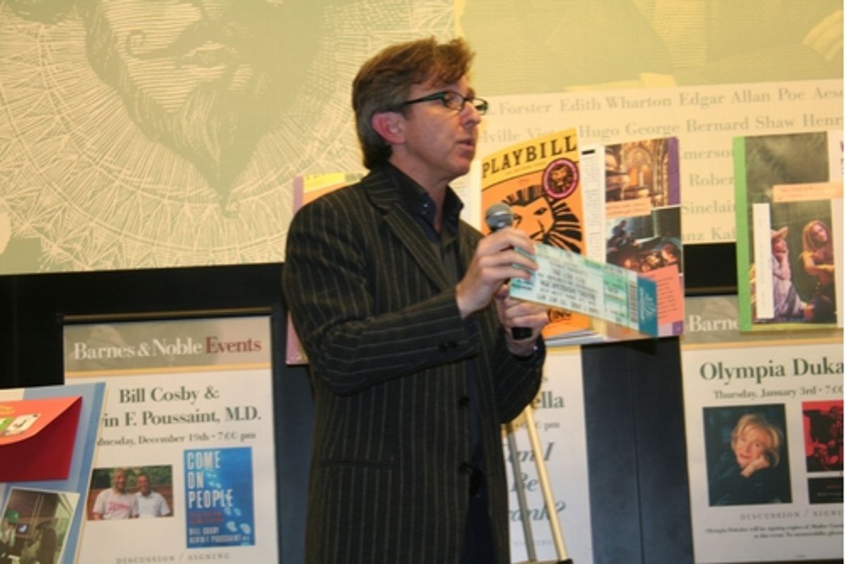 Thomas Schumacher shows one of many props included in the book at 