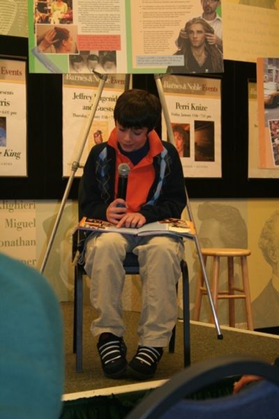 Mary Poppins' Henry Hodges reading the essay he contributed to the book Photo