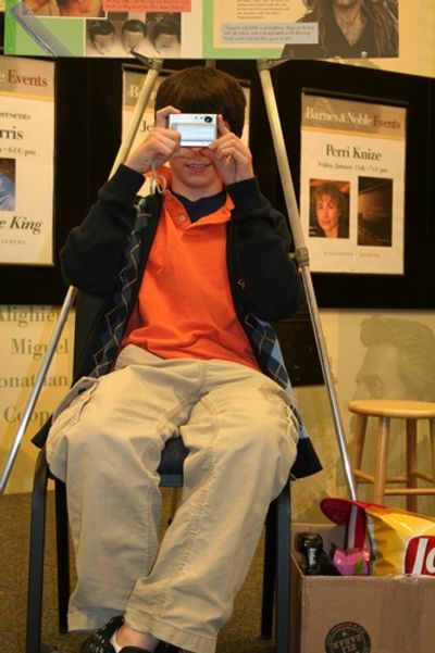 Henry Hodges showing some examples of what not to do in the theater in order to be cu Photo