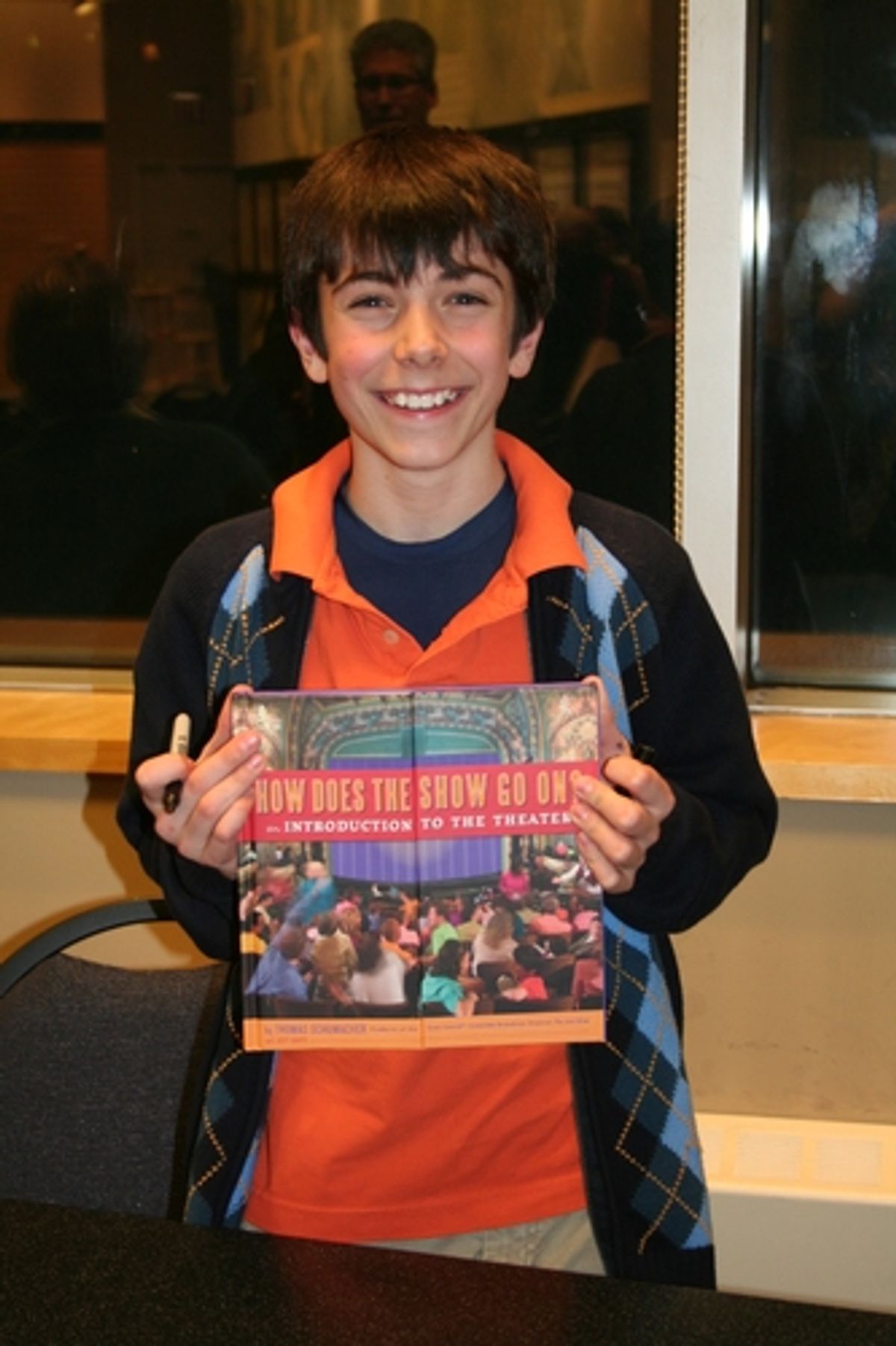 Henry Hodges at Disney's Tom Schumacher Signs 'How Does the Show Go On?'