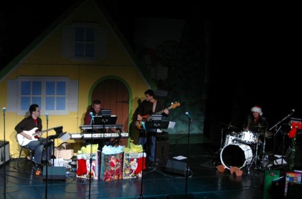 The Band (l-r): Ryan Parrino (guitar), Justin Paul (MD and keys), Dan Asher (bass), a Photo