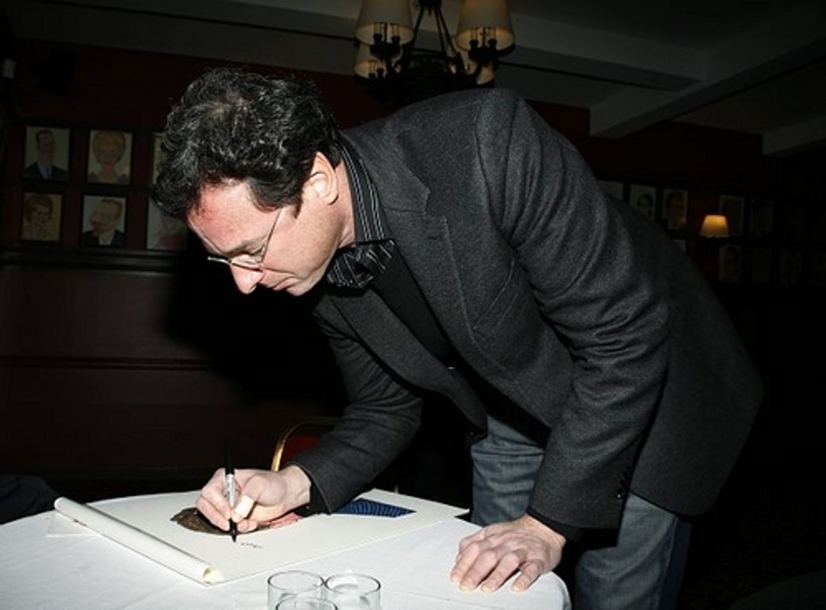 Bob Saget autographs his caricature
 at 