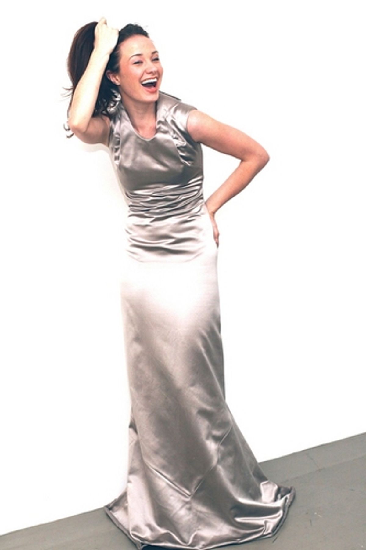 This gorgeous dress brings out the side pony-tail in me!
 at 