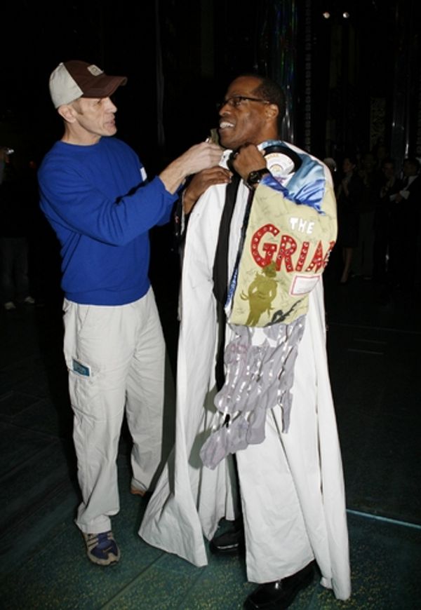 William Ryall bestows the Gypsy Robe upon Adrian Bailey Photo