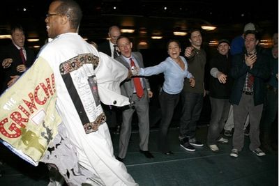 Adrian Bailey runs in circles amongst his cast Photo