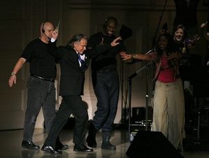 Harvey Keitel escorted on-stage by security Photo