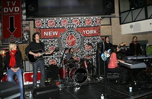 Idina Menzel and the band Photo