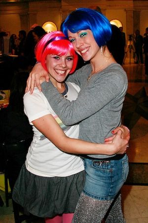 Catriona Stevens and Tammy McNeill help guests accessorize Xanadu style Photo