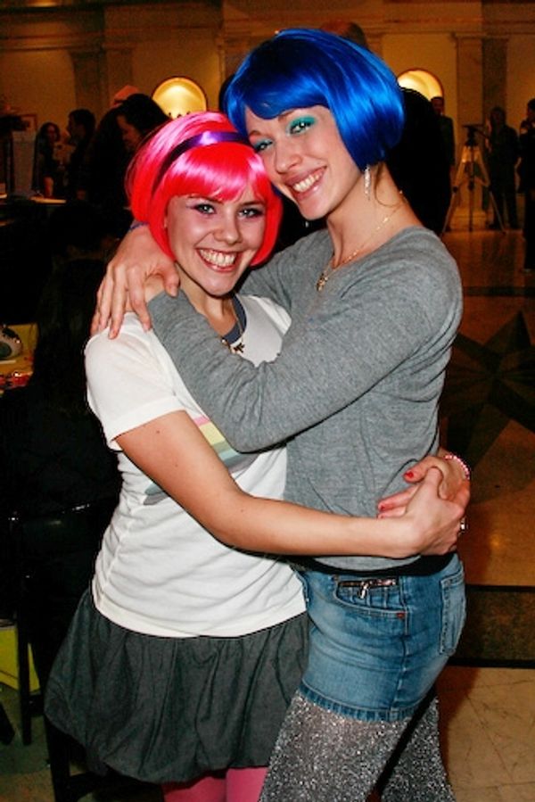 Catriona Stevens and Tammy McNeill help guests accessorize Xanadu style Photo