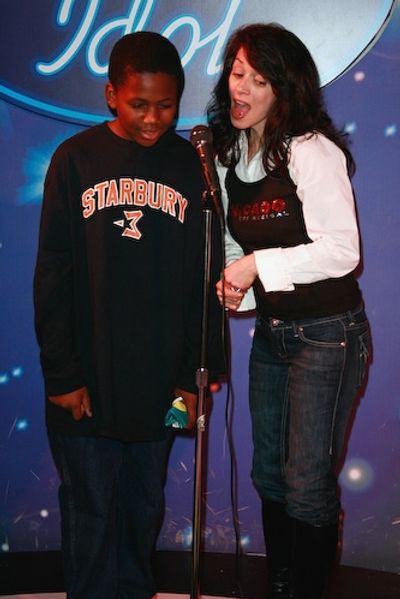 Donna Marie Asbury and friend sing "Summer Nights" Photo