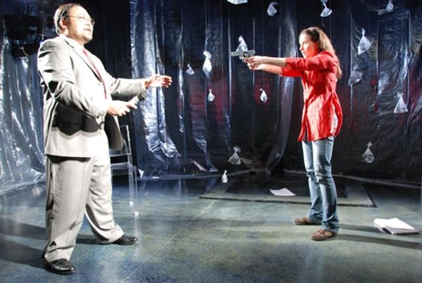 Orville Mendoza as Prime Minister (a.k.a. 'The Boss') and Sue Cremin as Eve Photo