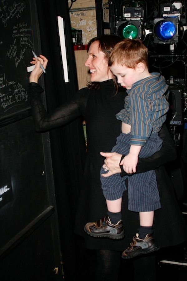 Molly Shannon and son Nolan Shannon Chestnut sign the special-guest wall Photo