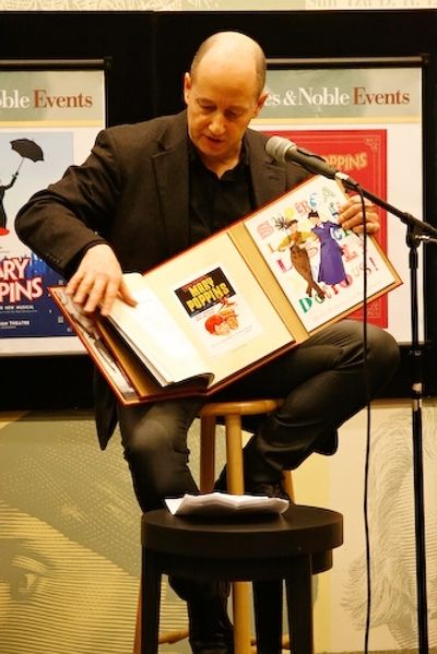 Steven Sorrentino shows off the book to the audience Photo