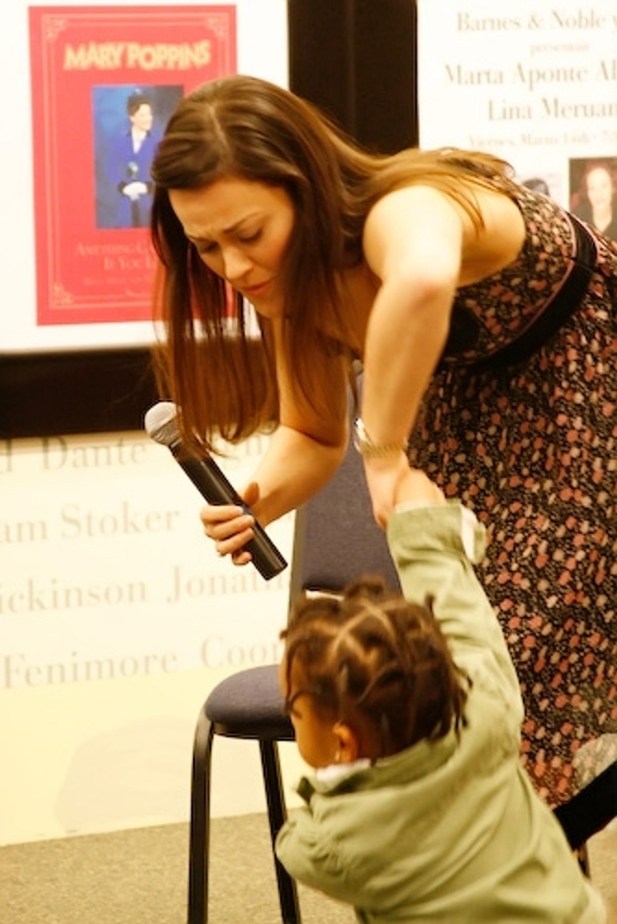 Ashley Brown brings an audience member on stage for a few questions at 