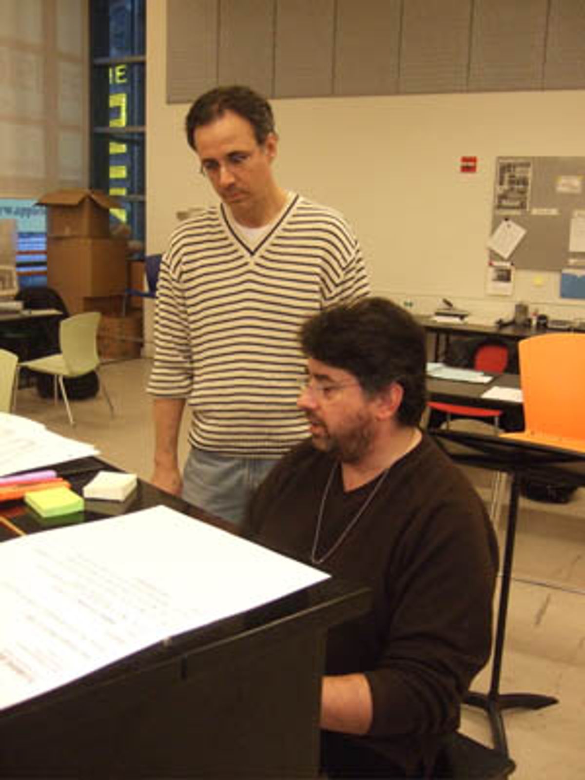 Here is composer JOHN BUCCHINO listening to a bit of his music played by musical director CONSTANTINE KITSOPOULOS.
 at 