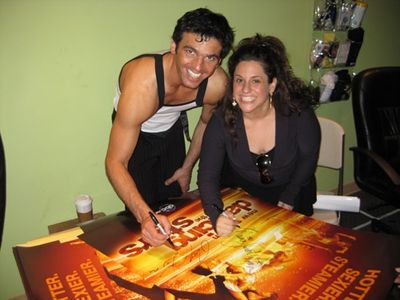 Tony Dovolani and Marissa Jaret Winokur: "First Tony and I
signed like 1000 posters  Photo