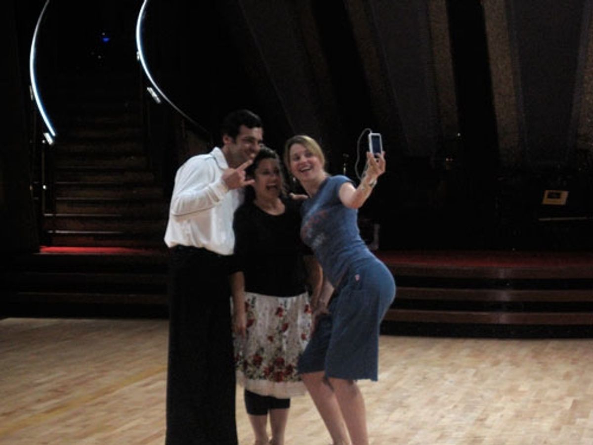 Lucy taking a photo for her Myspace page. or screen saver at 