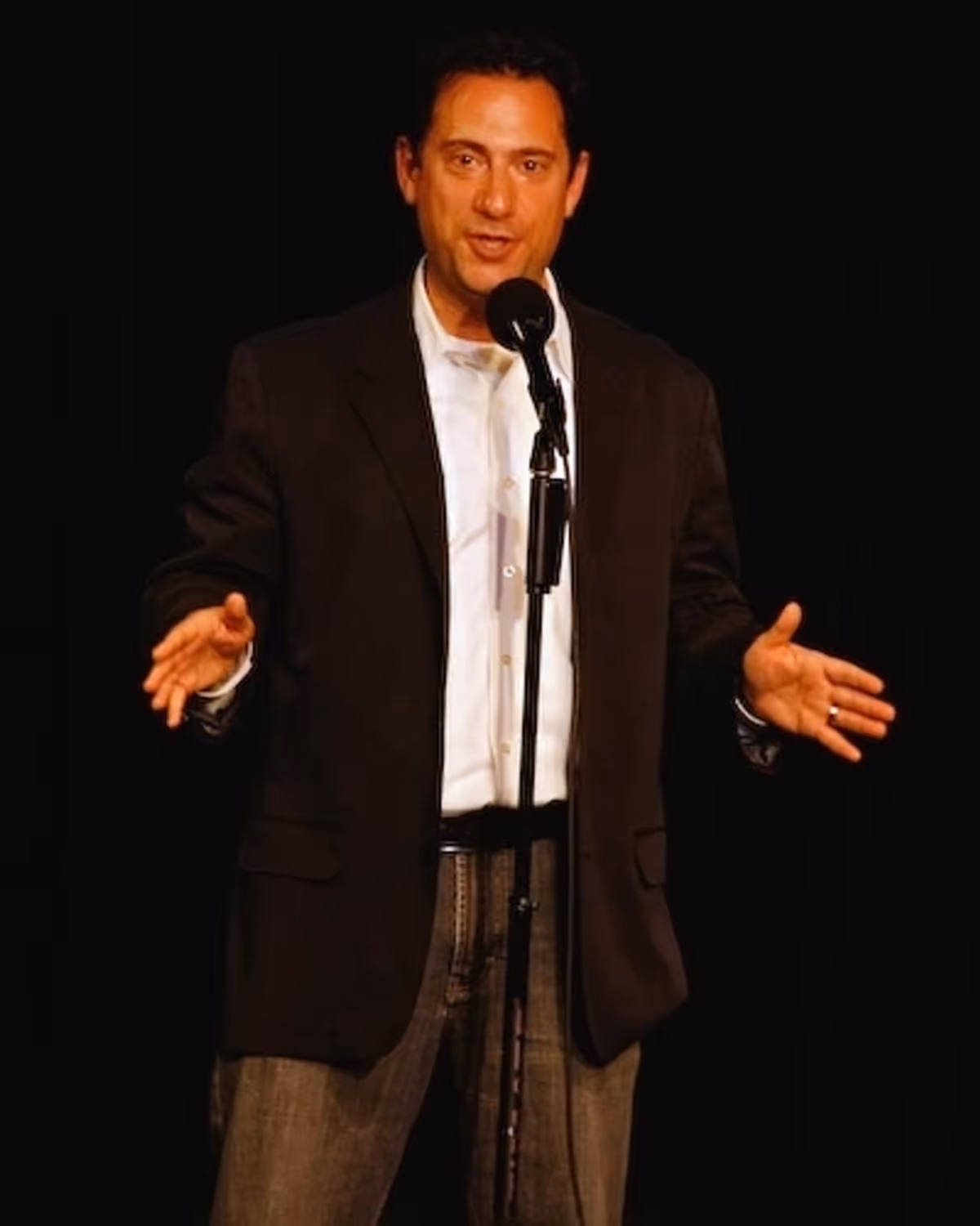 Eugene Pack opens the evening at Hoffman and Cumming Join Celeb Autobiography
