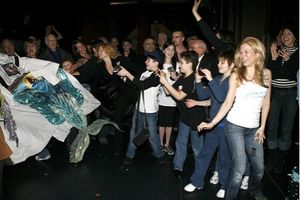 The crowd cheers on Steve Konopelski  Photo