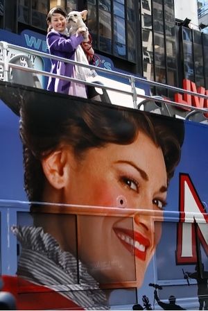 Ashley Brown on top of her bus in Times Square @ BroadwayWorld Ashley Brown on top of her bus in Times Square Photo