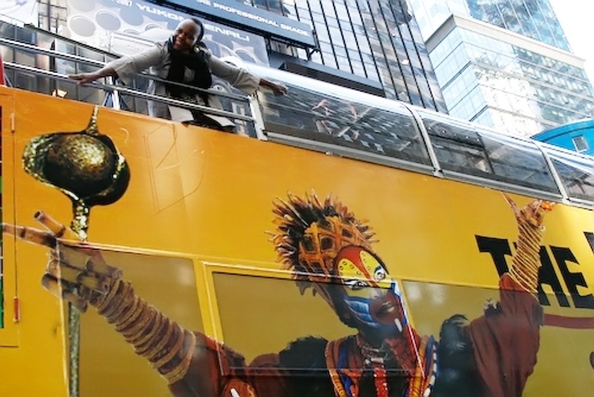 Tshidi Manye on top of her bus in Times Square at 