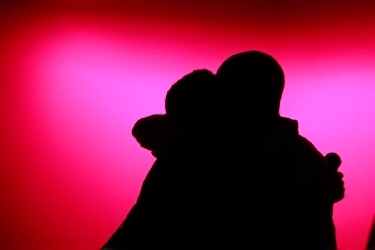 Cassondra Kellam and Tituss Burgess embrace
 at 