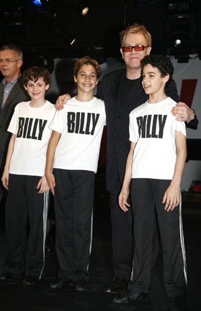 Elton John, Trent Kowalik, David Alvarez and Kiril Kulish Photo