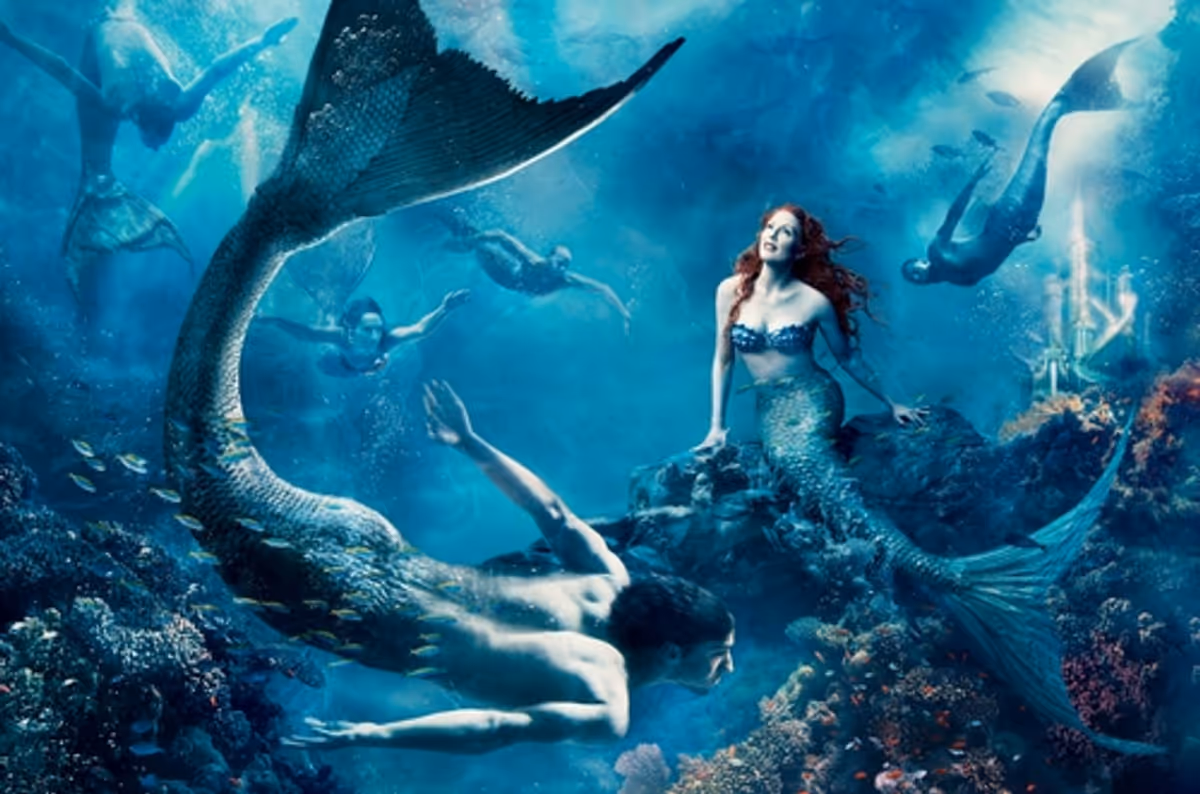 Julianne Moore, as Ariel, and world champion swimmer Michael Phelps, as a merman, star in the new Annie Leibovitz 'Dream Portrait' for Disney Parks. at Leibovitz takes Julianne Moore 'Under the Sea'