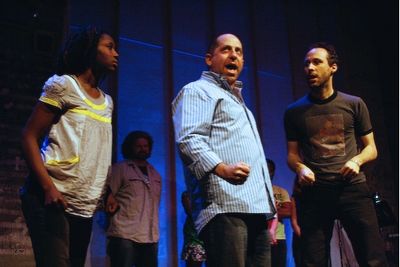 Vasthy Mompoint, Jason Kravits, and Gibson Frazier reenact a scene from the musical I Photo