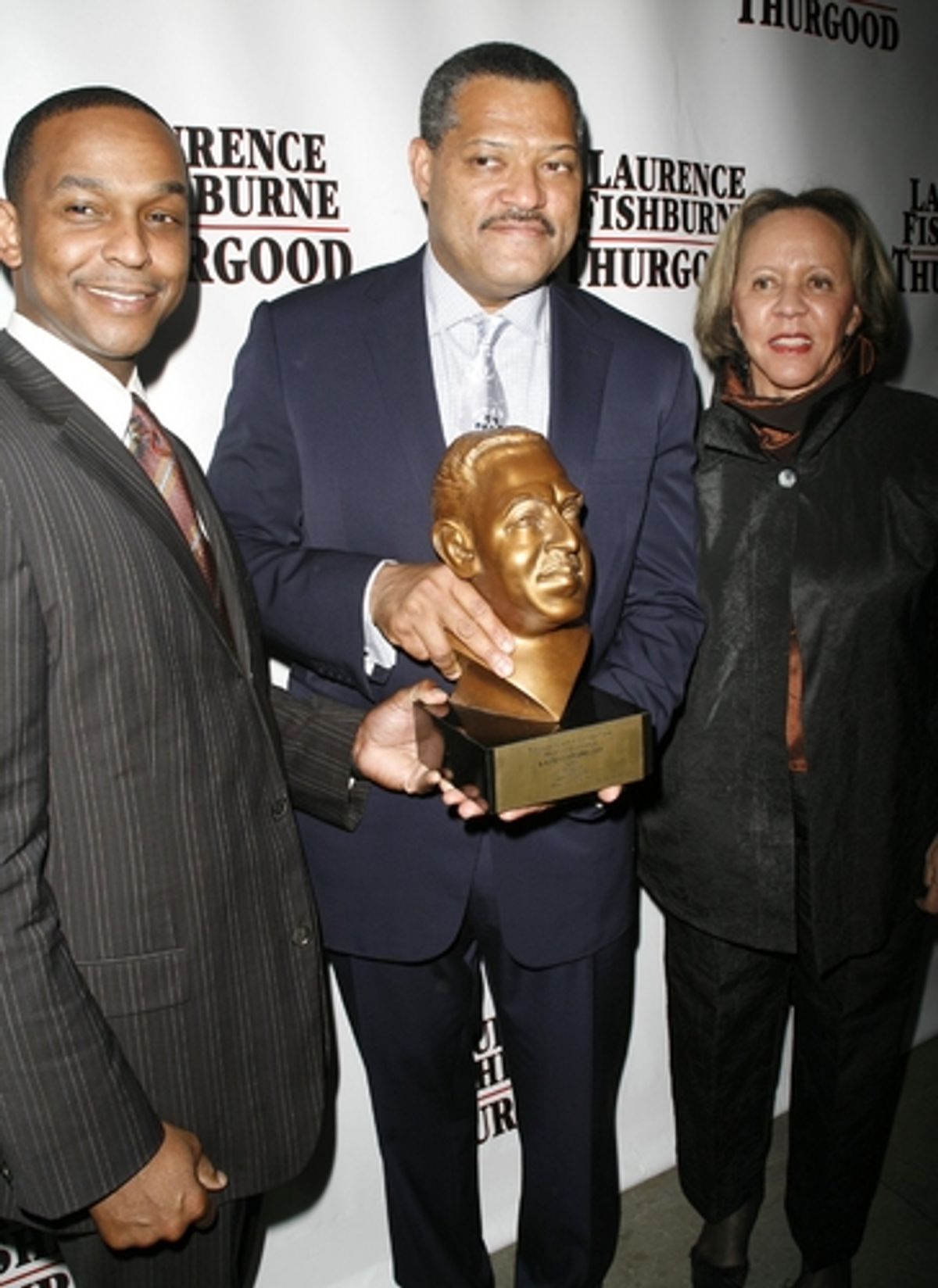Laurence Fishburne receiving an Award form the Thurgood Marshall College Fund from Dwayne Ashley and Dr. Joyce Payne at 