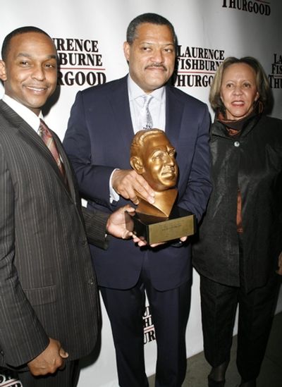 Laurence Fishburne receiving an Award form the Thurgood Marshall College Fund from Dw Photo