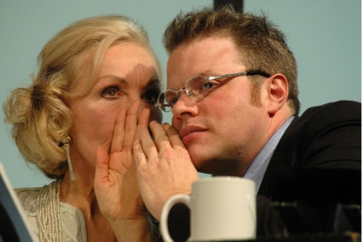 Julie Newmar confers with Host Julie Newmar confers with Host Julie Newmar confers with Host J. Keith Van Straaten  at 