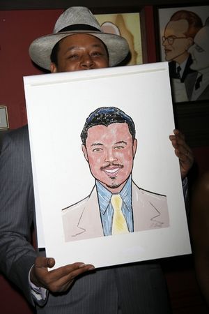 Terrence Howard with his caricature @ BroadwayWorld Terrence Howard with his caricature Photo